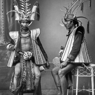 Studio portrait of two noble men warriors from South Nias. Tropenmuseum Collection.