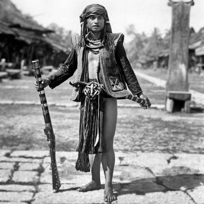 South Nias Warrior with a blunderbuss gun. Tropenmuseum Collection.