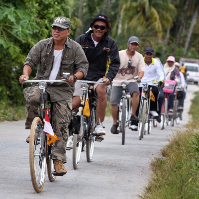 A local bike club on a tour of North Nias. Many small roads across the island make Nias the perfect bike destination.